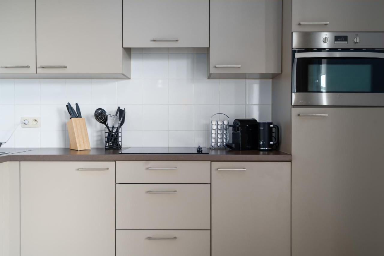 SHS Homes: Luxe Highrise with Stunning Views and Workspace Hasselt Exterior photo